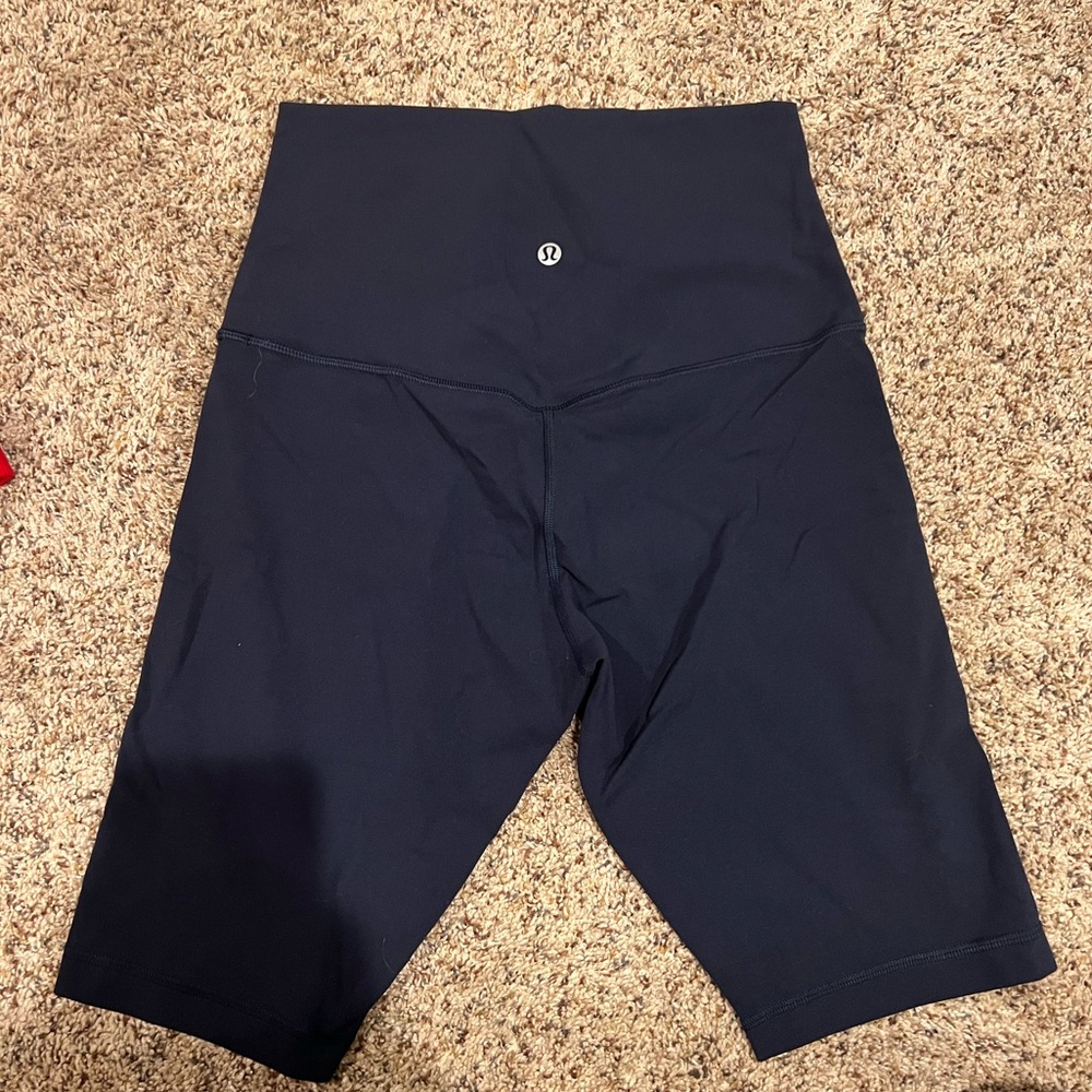 NWOT align 10’ biker shorts. Size 8. Color is navy.